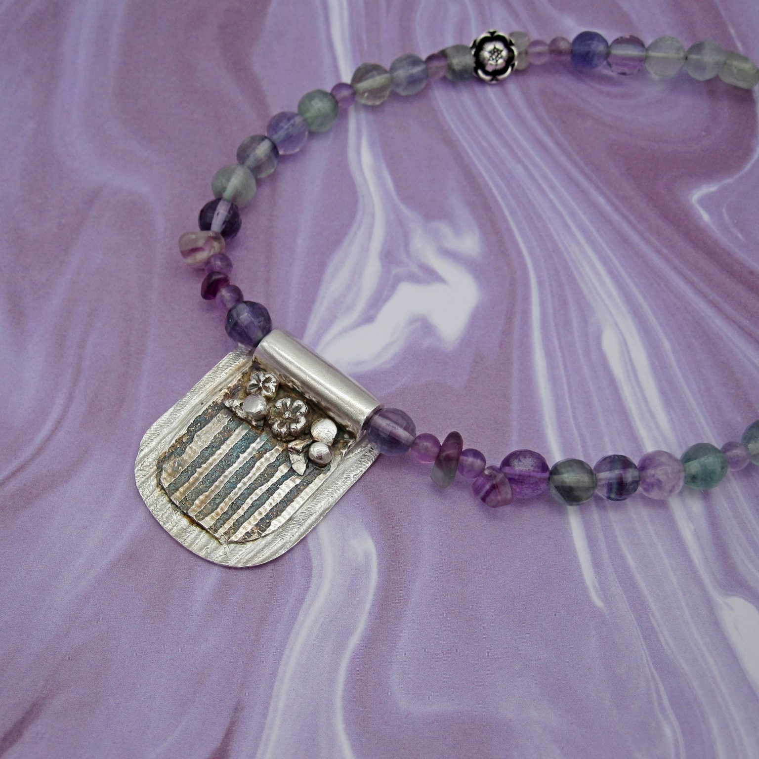 Handcrafted silver necklace with fluorite and amethyst